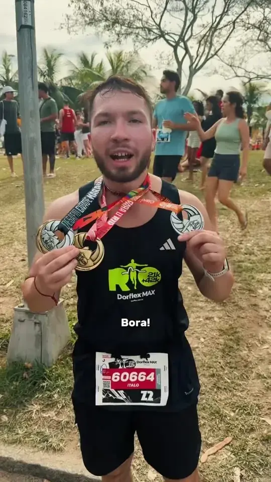Chegada com a medalha no peito